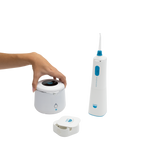 Remi Wellness water flosser and ultrasonic cleaner in use