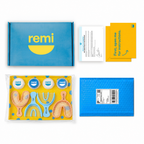 A Remi Wellness dental impression tray kit with blue and yellow packaging, mouth trays labeled top and bottom, putty for creating accurate impressions, instructions, a return shipping envelope, and a certification card—all neatly arranged on a white background.